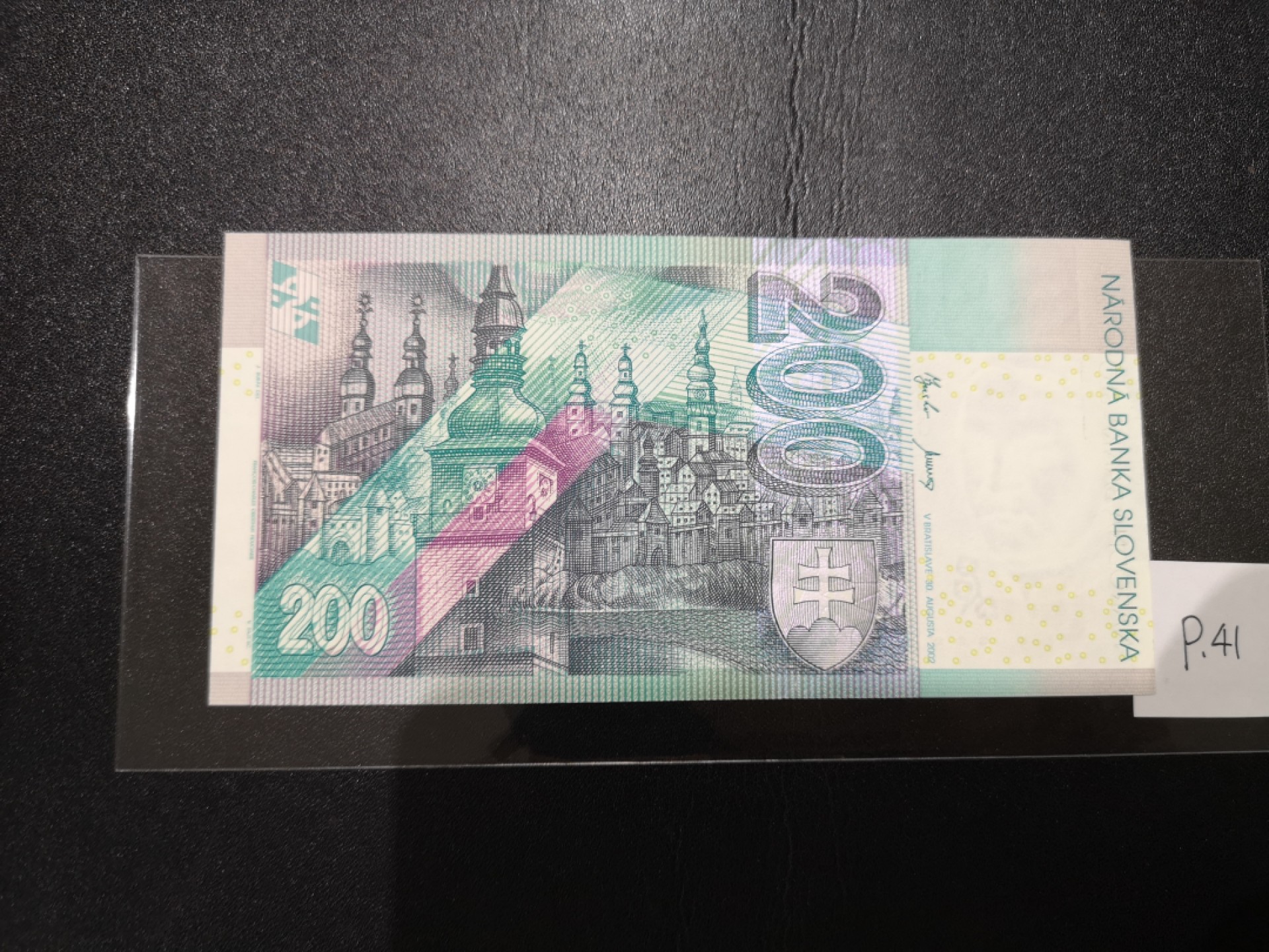 《外钞收藏家》第二百零七期（东欧三国裸钞专场） 斯洛伐克-2002-200 克朗 法国欧贝特印刷，带光变油墨图案，唯一冠E 全新