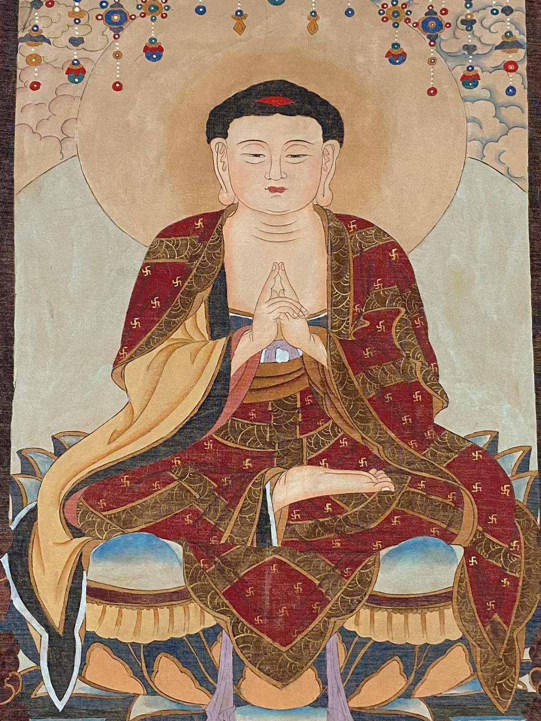 尤求绢本佛像立轴