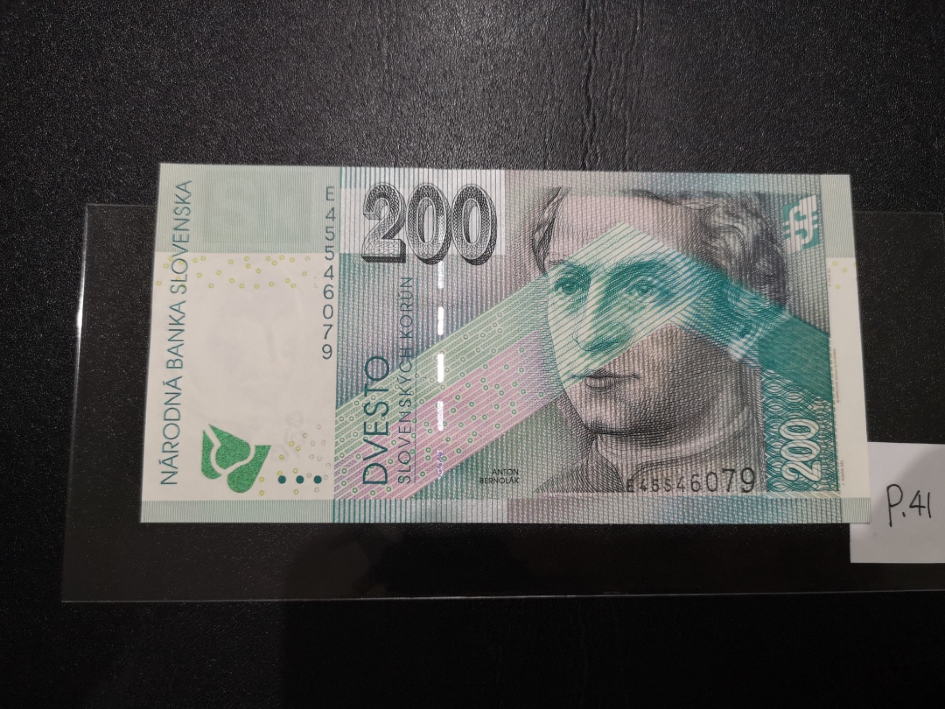 《外钞收藏家》第二百零七期（东欧三国裸钞专场） 斯洛伐克-2002-200 克朗 法国欧贝特印刷，带光变油墨图案，唯一冠E 全新