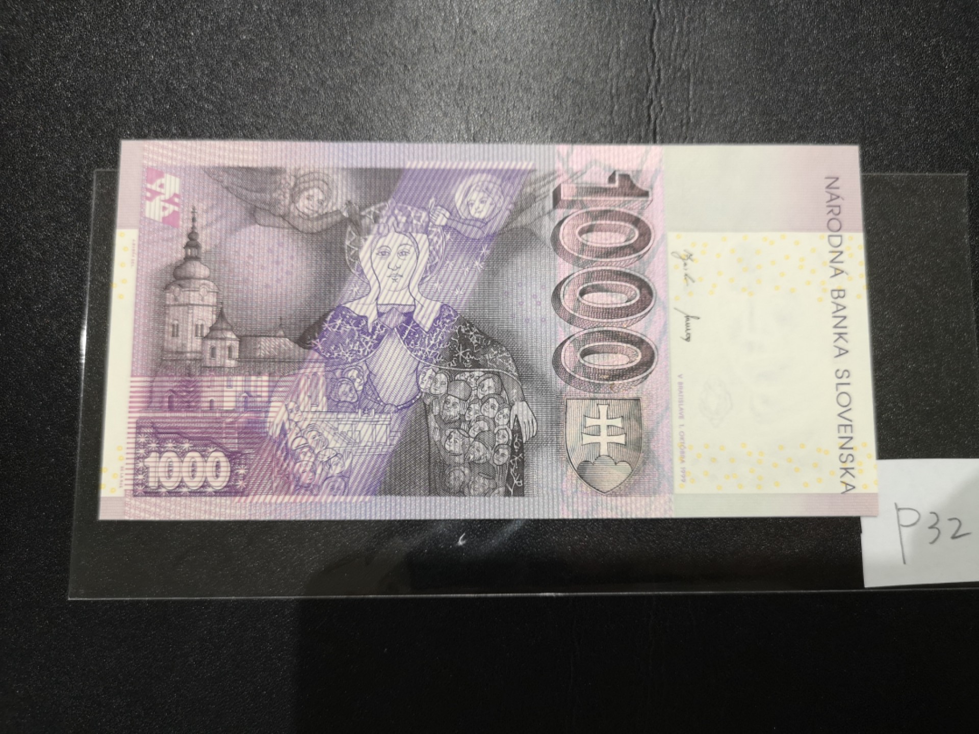 《外钞收藏家》第二百零七期（东欧三国裸钞专场） 斯洛伐克-1999-1000 克朗 德纳罗版，带光变油墨图案，首冠G 全新