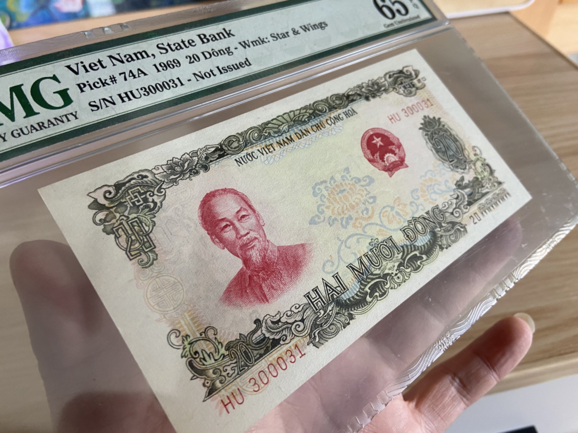 27.【鲸贝乐★道德经】第“圣人不仁，以百姓为刍狗”号拍卖 【中国代印★越南🇻🇳】1969年20盾，未发行版本，珍品PMG65E