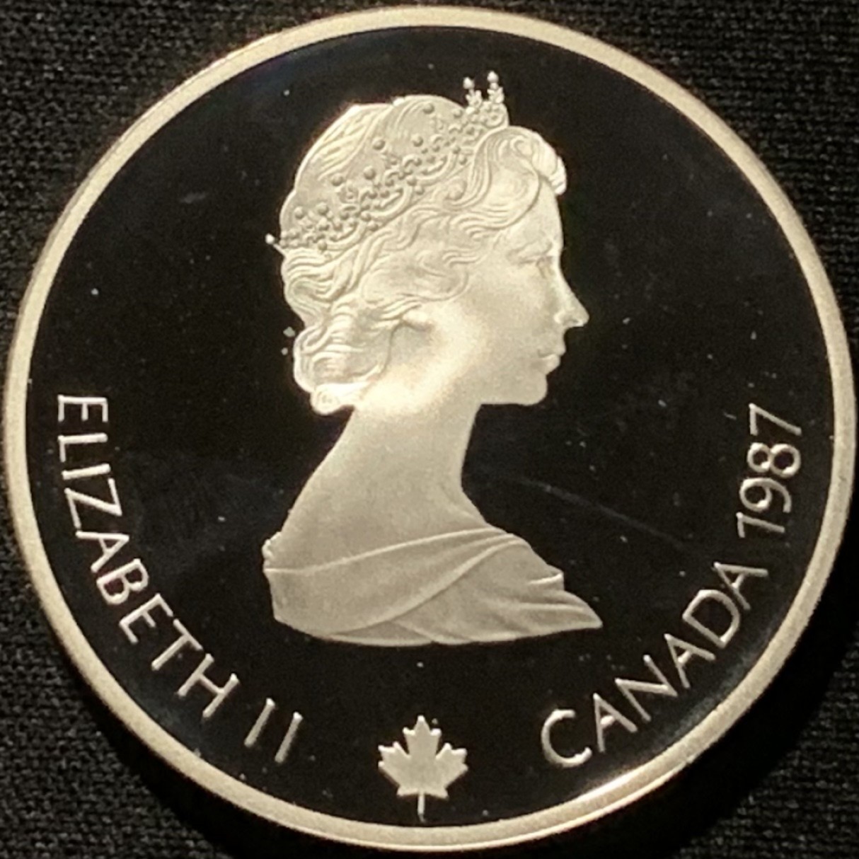 紫瑗钱币——第216期拍卖 加拿大 1987年 卡尔加里冬奥会 跳台滑雪 20元 34.1克 0.925银 精制