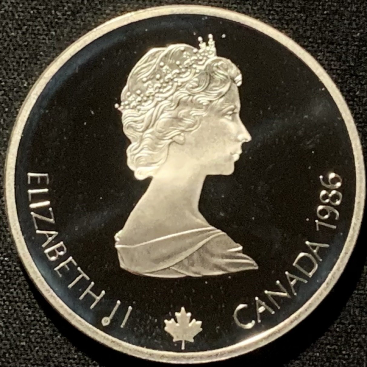 紫瑗钱币——第216期拍卖 加拿大 1986年 卡尔加里冬奥会 高台滑雪 20元 34.1克 0.925银 精制