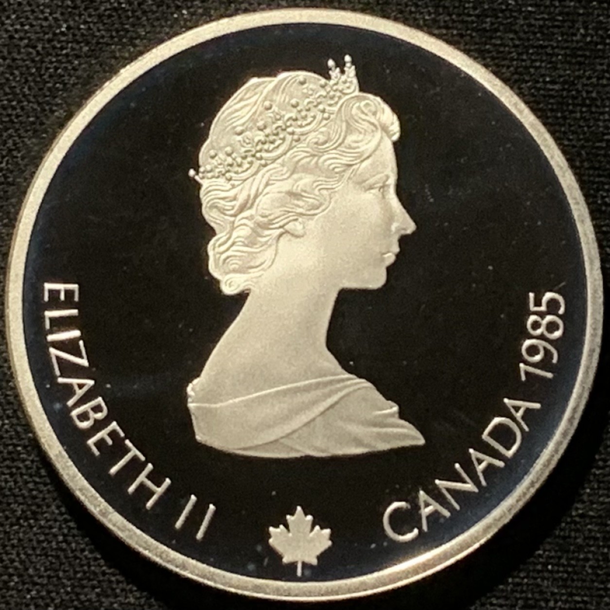 紫瑗钱币——第216期拍卖 加拿大 1985年 卡尔加里冬奥运 越野滑雪 20元 银币 34.1克 0925银 精制