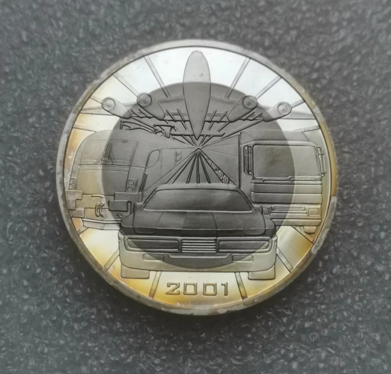 瓶子🏺第61期拍卖会 奥地利2001年100先令交通工具银钛双色币