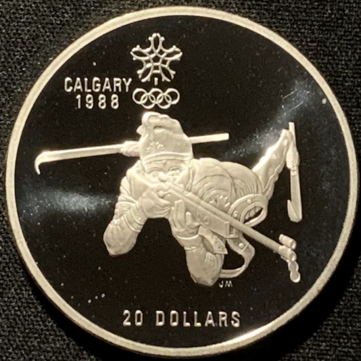 紫瑗钱币——第216期拍卖 加拿大 1986年 卡尔加里冬奥会 卧射 20元 34.1克 0.925银 精制
