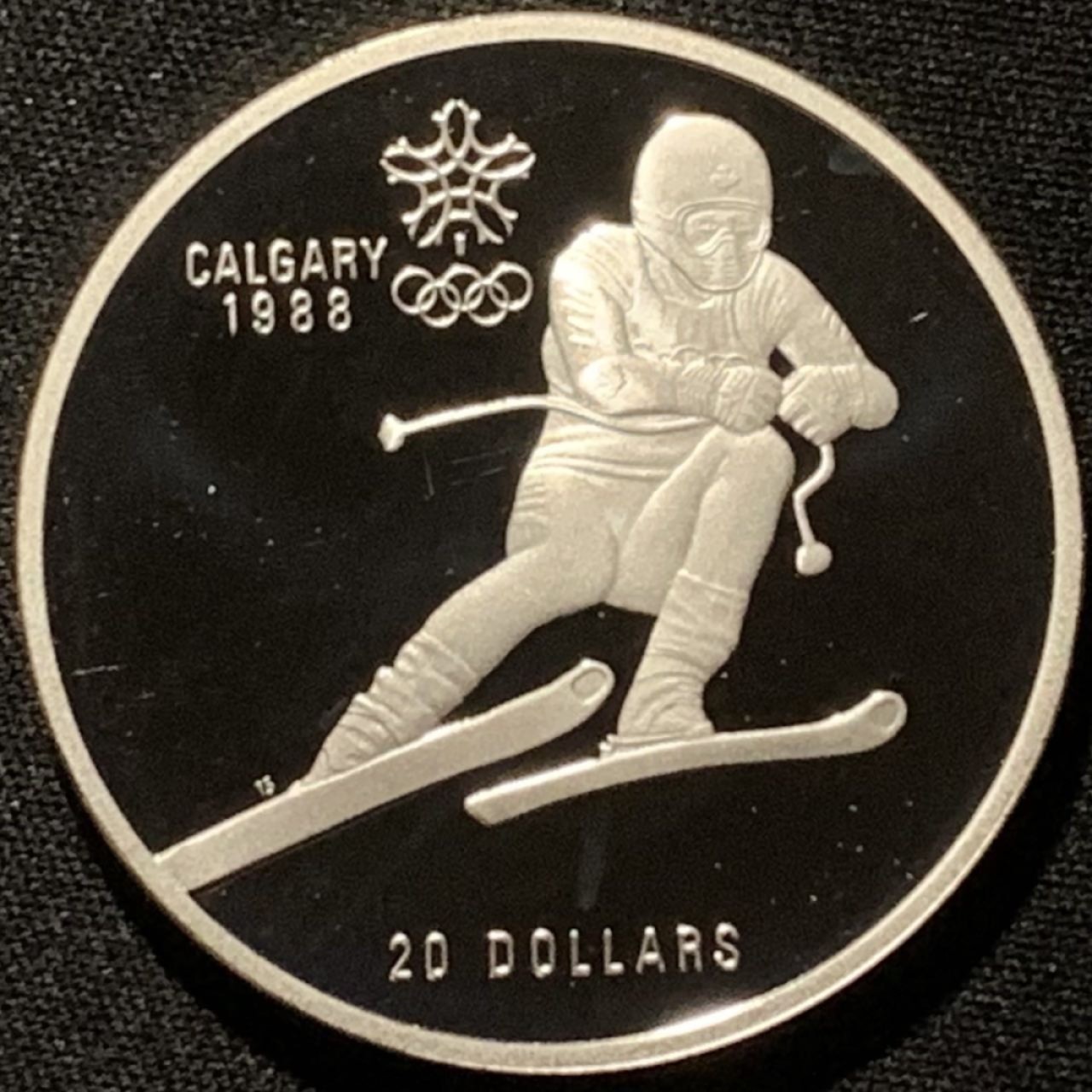 紫瑗钱币——第216期拍卖 加拿大 1985年 卡尔加里冬奥运 越野滑雪 20元 银币 34.1克 0925银 精制