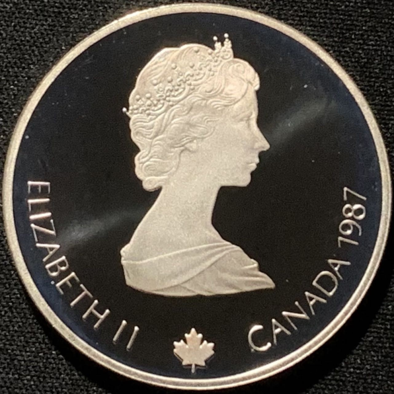 紫瑗钱币——第216期拍卖 加拿大 1987年 卡尔加里冬奥会 速滑车 20元 34.1克 0.925银 精制