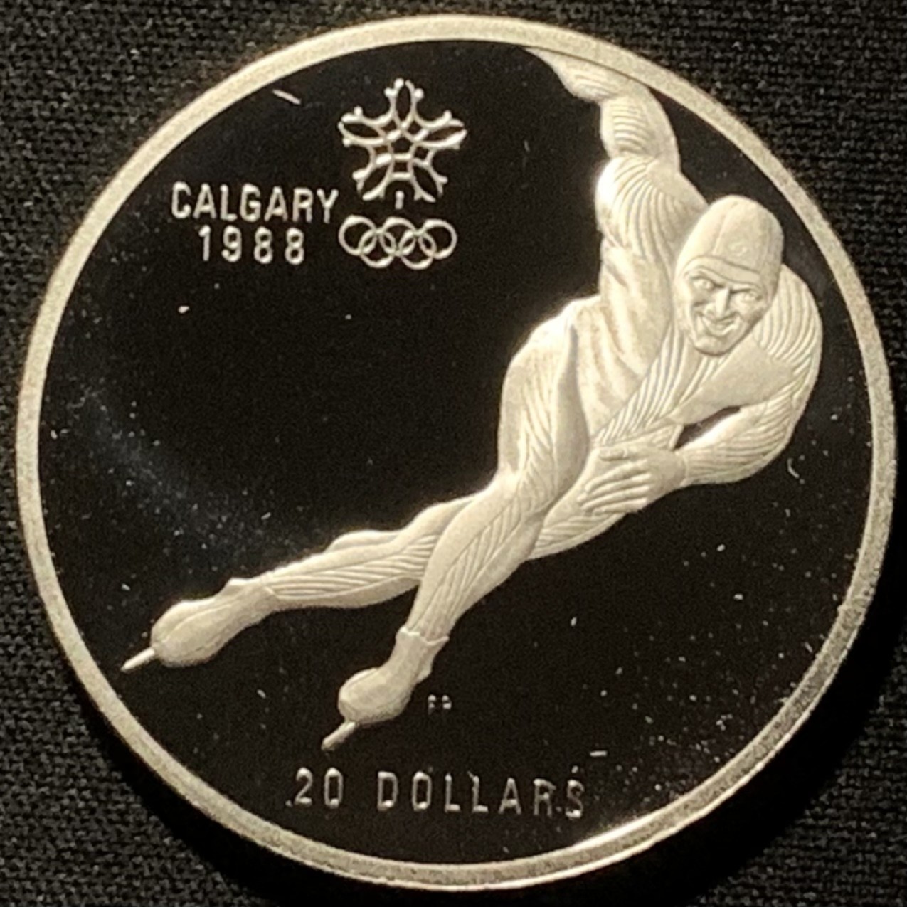 紫瑗钱币——第216期拍卖 加拿大 1985年 卡尔加里冬奥运 短道速滑 20元 银币 34.1克 0.925银 精制