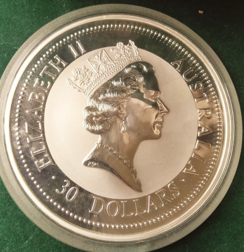 【保诚微拍】第36期  古今中外币章（部分评级）14号晚上七点半自动开拍！！！  澳大利亚 1996年 翠鸟羽毛公斤银币