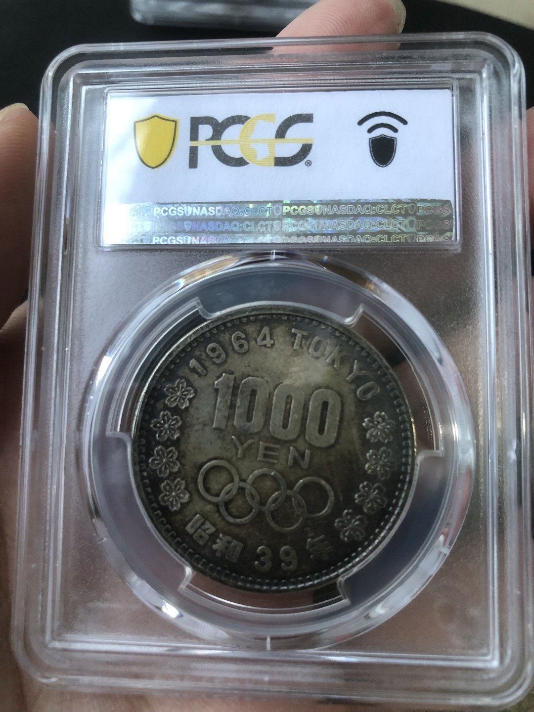 【保诚微拍】第36期  古今中外币章（部分评级）14号晚上七点半自动开拍！！！ 【PCGS MS62】日本 1964年 东京奥运会 1000日元 大奥纪念银币（25克 0.925银）1