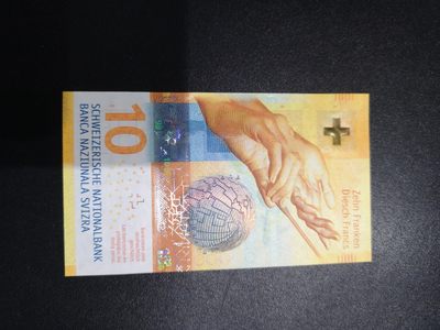 《外钞收藏家》第二百零九期 - 最新版瑞士10法郎 16A首发冠 全新UNC