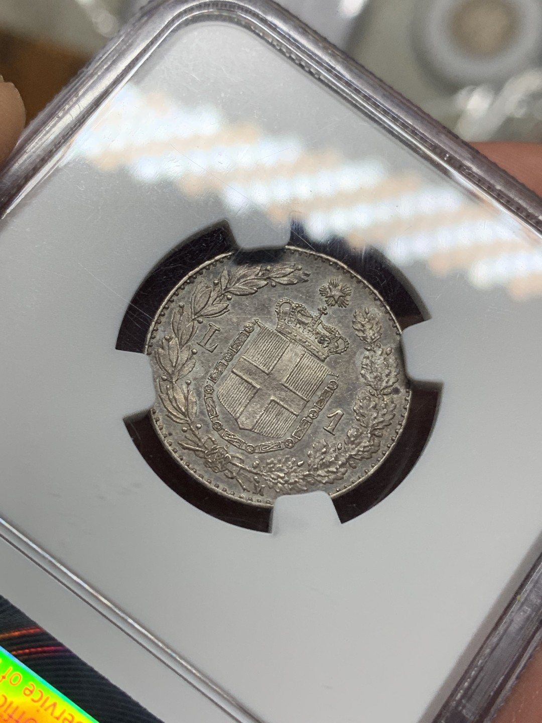 《竞宝斋》第106场-周日，周一 2场连拍（全场包邮） NGC MS62 意大利 1887年 翁贝托1里拉 银币 双面深五彩包浆 状态难得