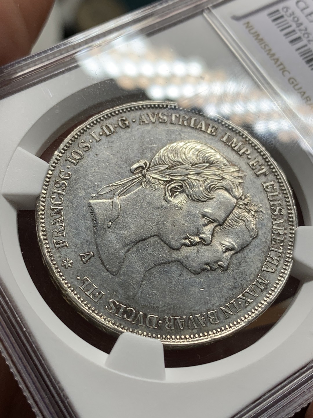 《竞宝斋》第106场-周日，周一 2场连拍（全场包邮） NGC UNC 奥匈帝国 茜茜公主1854年 结婚纪念二盾银币，非常少见的婚礼版 执子之手场景满满 值得珍藏 大热品种