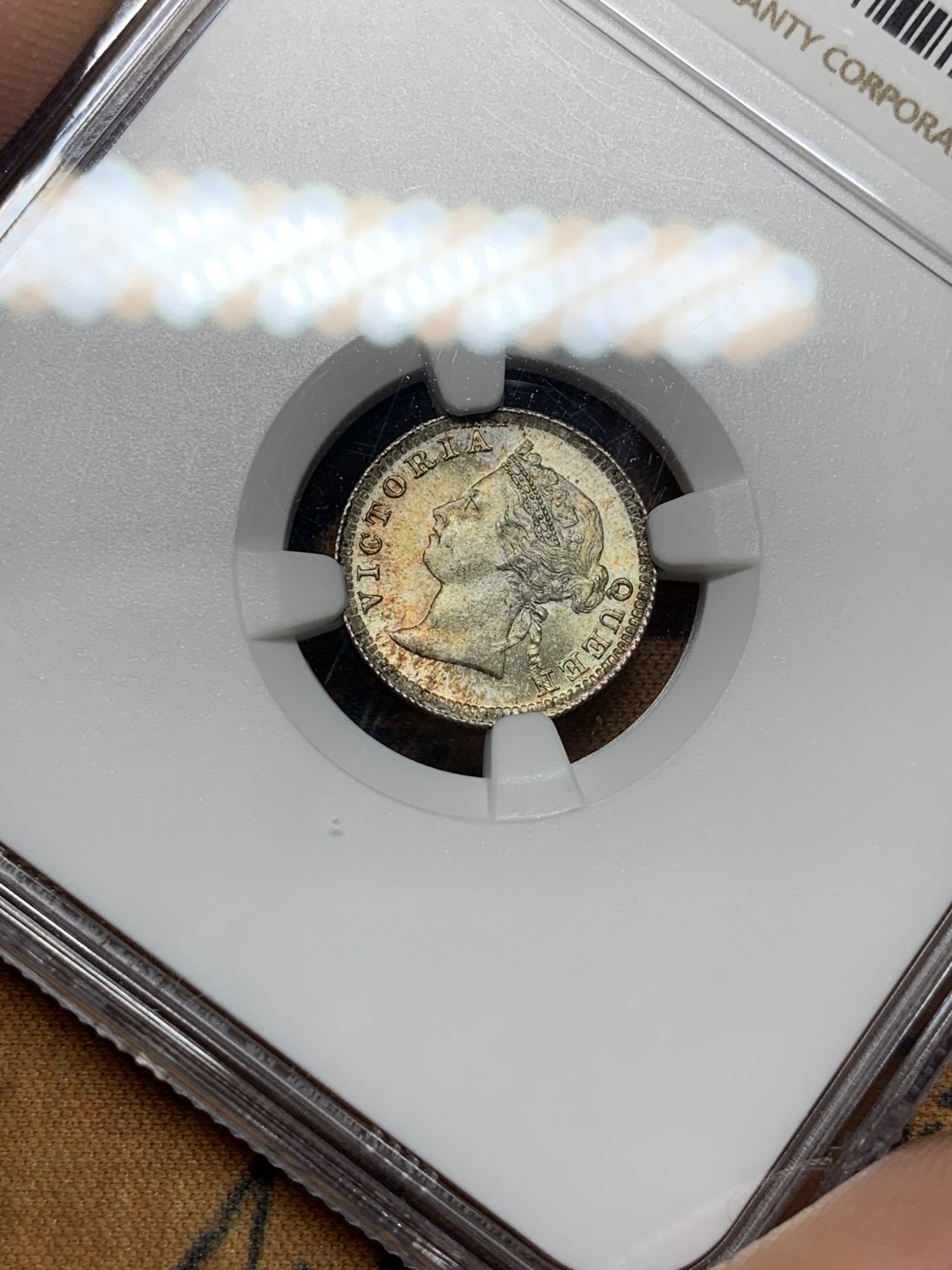 《竞宝斋》第106场-周日，周一 2场连拍（全场包邮） NGC MS63 香港 1901 5仙银币 双面五彩 十字转光