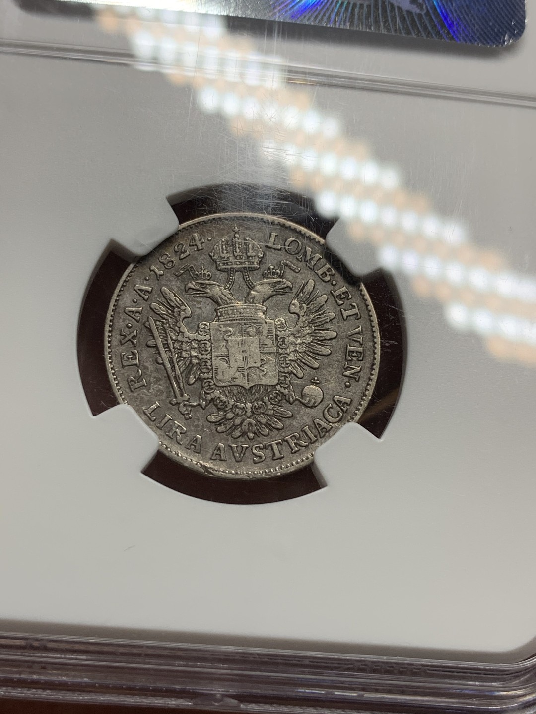 《竞宝斋》第106场-周日，周一 2场连拍（全场包邮） NGC VF35 奥属意大利伦巴第1824年 1里拉银币 细节清晰，少见品种