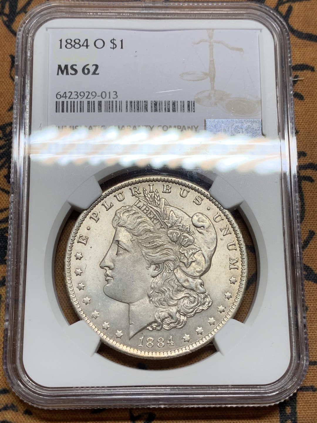 《竞宝斋》第106场-周日，周一 2场连拍（全场包邮） NGC-MS62 美国1884-O年 摩根一元银币 原光好品 较少的厂名