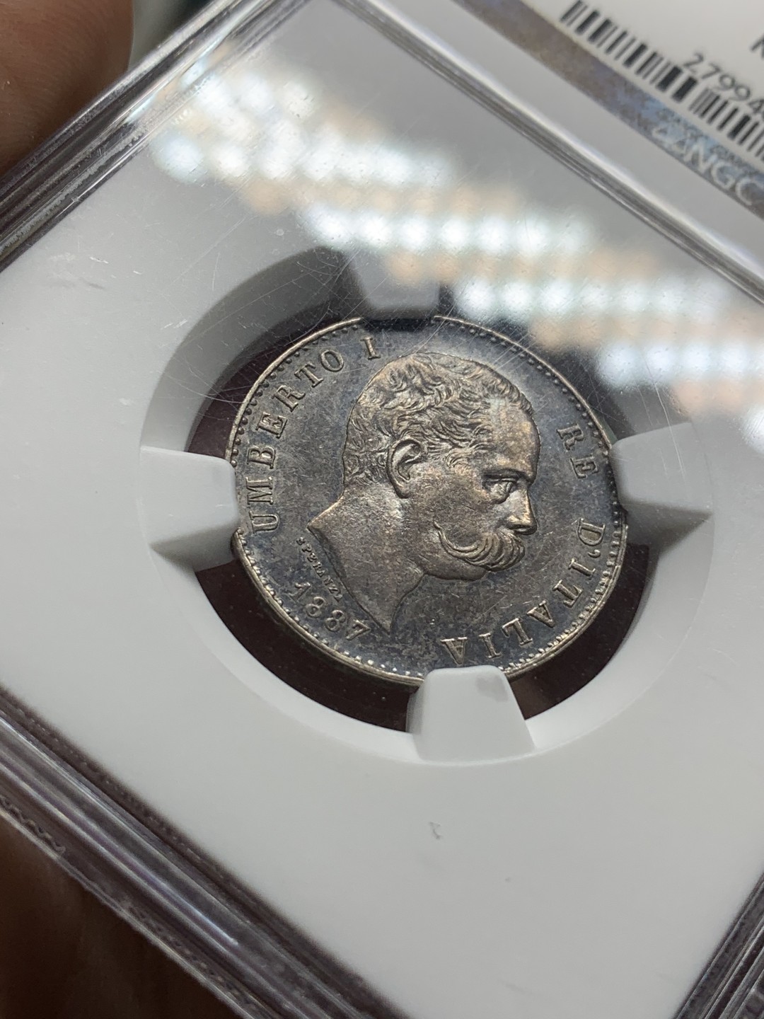 《竞宝斋》第106场-周日，周一 2场连拍（全场包邮） NGC MS62 意大利 1887年 翁贝托1里拉 银币 双面深五彩包浆 状态难得