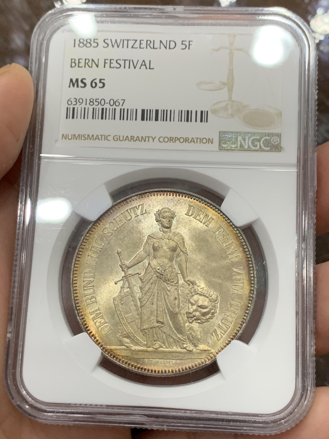 《竞宝斋》第106场-周日，周一 2场连拍（全场包邮） NGC-MS65 1885瑞士伯尔尼射击节5法郎银币 状态及其完美 正面金色包浆背面凝霜 外拍成交价已经很高了