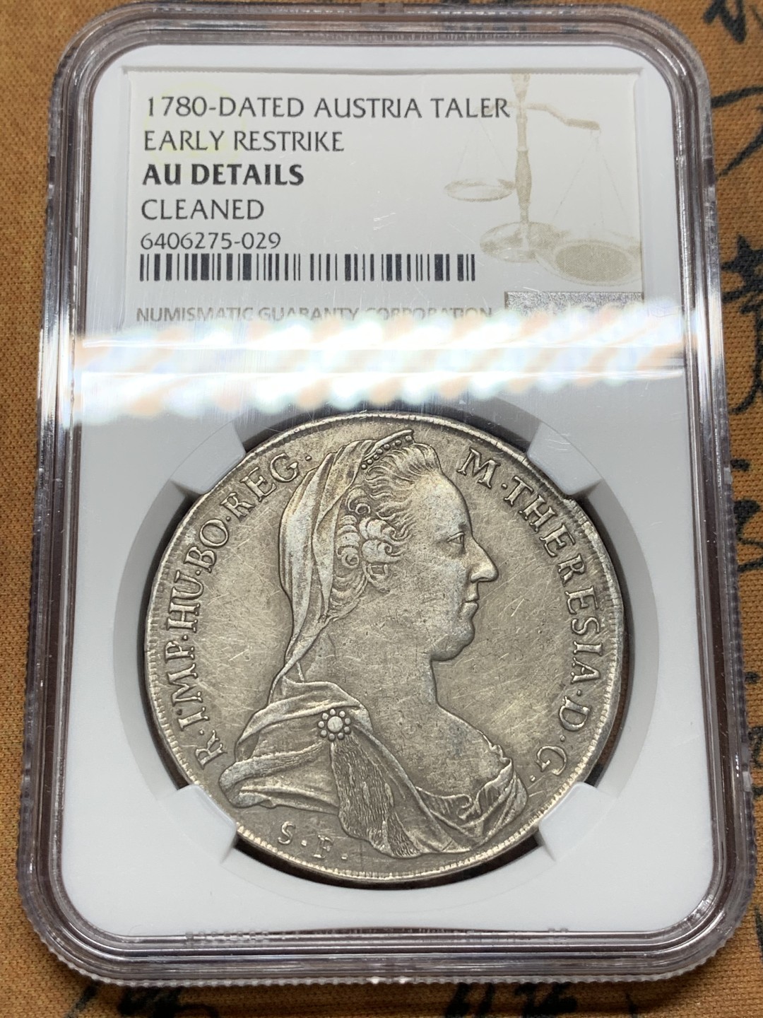 《竞宝斋》第106场-周日，周一 2场连拍（全场包邮） NGC-AUD 奥地利“1780年”特蕾莎1泰勒银币 1817-1833年铸造 威尼斯 对应目录编号应该是37a N就给了早期后铸要加强了