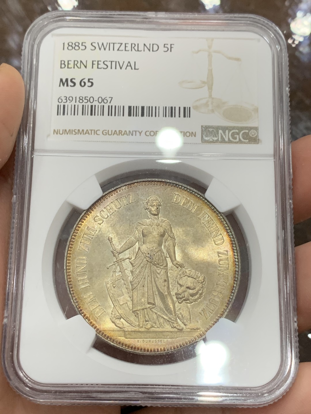 《竞宝斋》第106场-周日，周一 2场连拍（全场包邮） NGC-MS65 1885瑞士伯尔尼射击节5法郎银币 状态及其完美 正面金色包浆背面凝霜 外拍成交价已经很高了