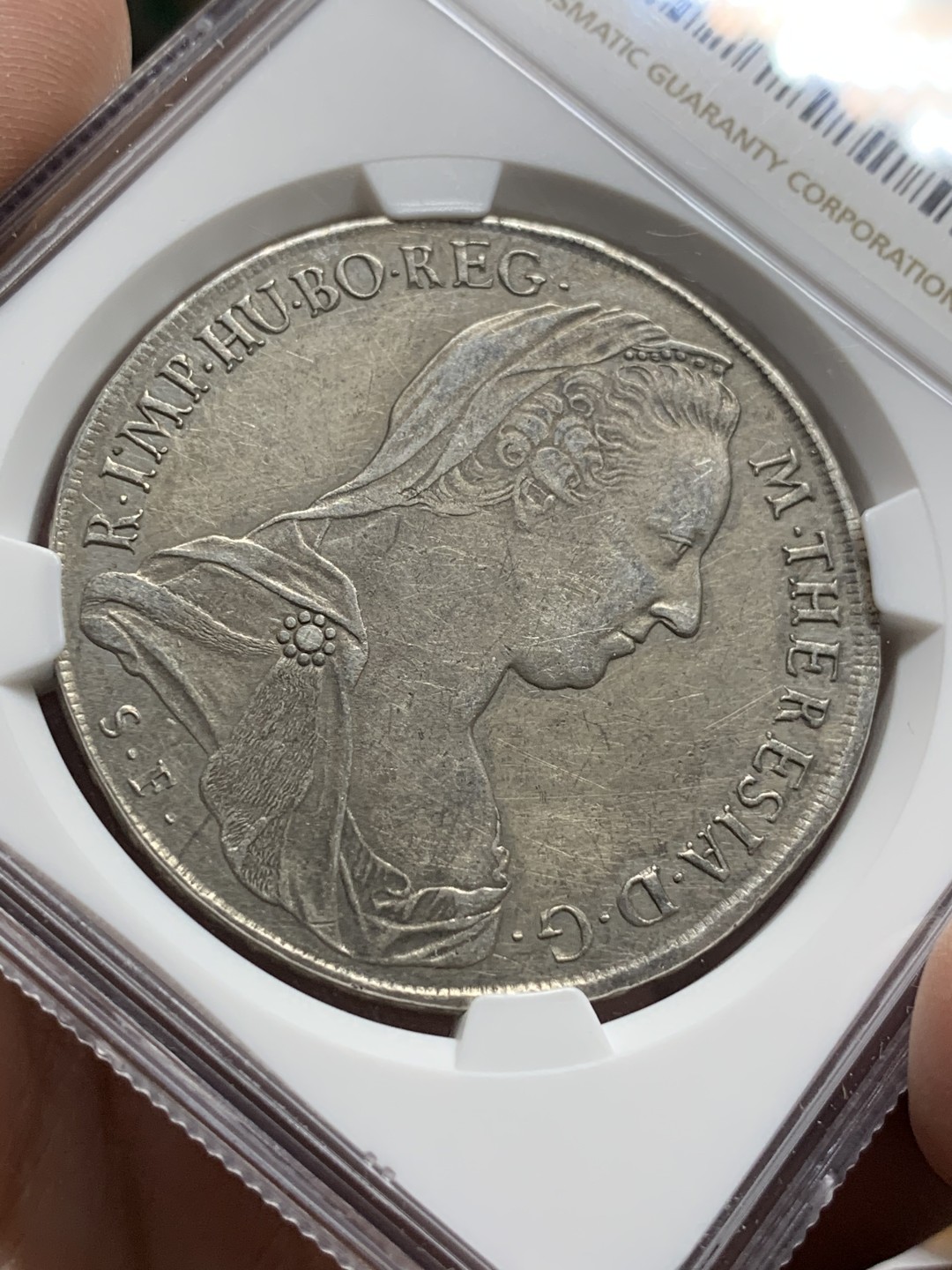 《竞宝斋》第106场-周日，周一 2场连拍（全场包邮） NGC-AUD 奥地利“1780年”特蕾莎1泰勒银币 1817-1833年铸造 威尼斯 对应目录编号应该是37a N就给了早期后铸要加强了