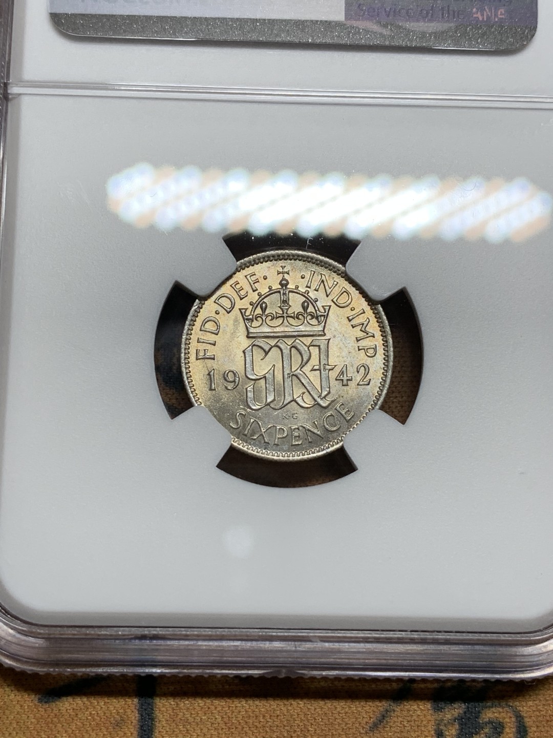 《竞宝斋》第106场-周日，周一 2场连拍（全场包邮） NGC-MS63 英国1942年 乔六6便士银币 原光好品