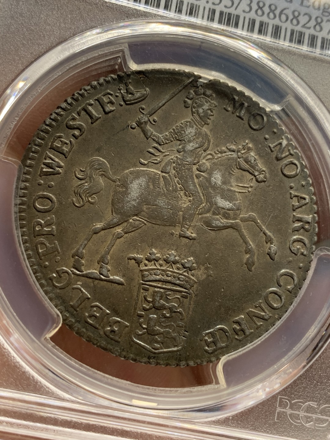 《竞宝斋》第106场-周日，周一 2场连拍（全场包邮） 亚军 PCGS AU55 荷兰 少见德 西弗利斯兰省 1764年 半杜卡特马剑银币 早期垂尾品种 双面深彩包浆状态极好 这个状态难觅 P标错了 细节见图