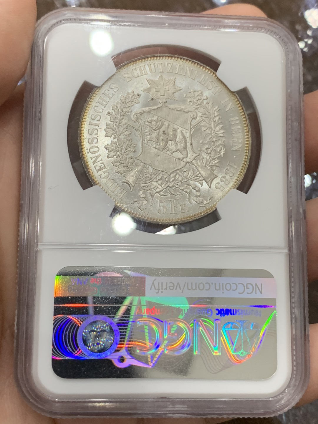 《竞宝斋》第106场-周日，周一 2场连拍（全场包邮） NGC-MS65 1885瑞士伯尔尼射击节5法郎银币 状态及其完美 正面金色包浆背面凝霜 外拍成交价已经很高了