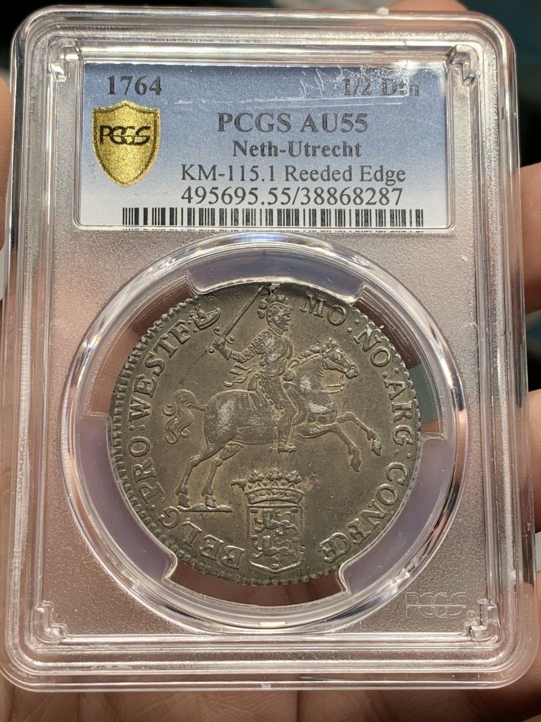 《竞宝斋》第106场-周日，周一 2场连拍（全场包邮） 亚军 PCGS AU55 荷兰 少见德 西弗利斯兰省 1764年 半杜卡特马剑银币 早期垂尾品种 双面深彩包浆状态极好 这个状态难觅 P标错了 细节见图