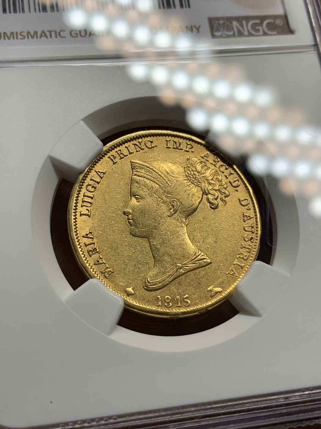 《竞宝斋》第106场-周日，周一 2场连拍（全场包邮） NGC-AU58 1815年意大利帕尔马40里拉金币 12.9克 拿皇的第二任妻子头像的金币，克书价极高，HA上MS的2万多不含佣金，AU58性价比高