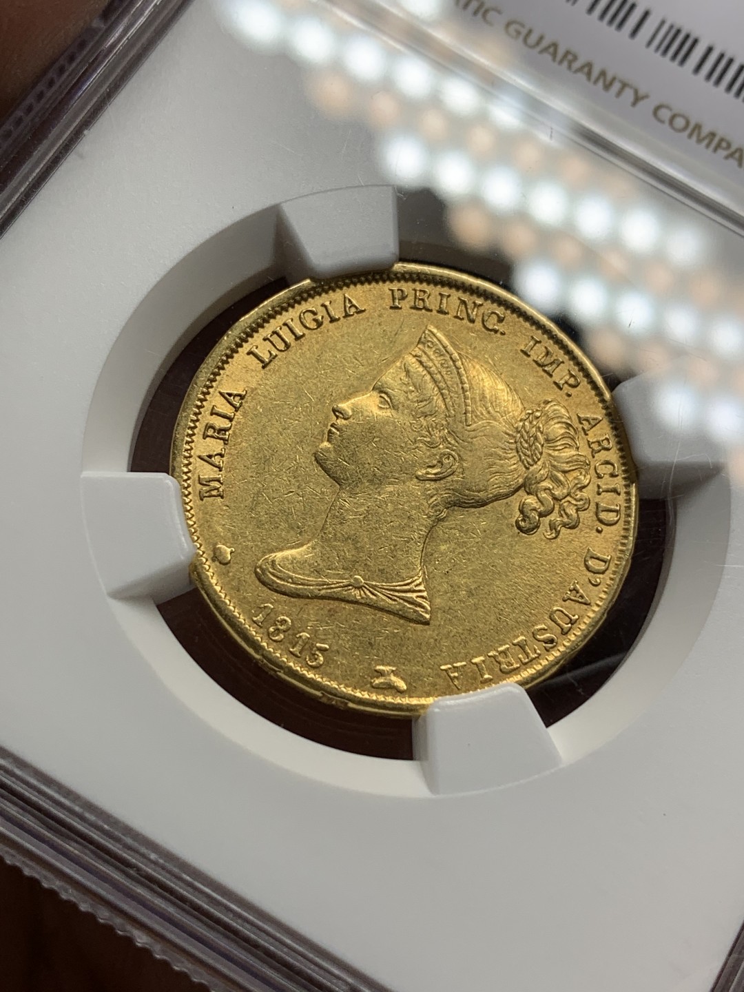 《竞宝斋》第106场-周日，周一 2场连拍（全场包邮） NGC-AU58 1815年意大利帕尔马40里拉金币 12.9克 拿皇的第二任妻子头像的金币，克书价极高，HA上MS的2万多不含佣金，AU58性价比高