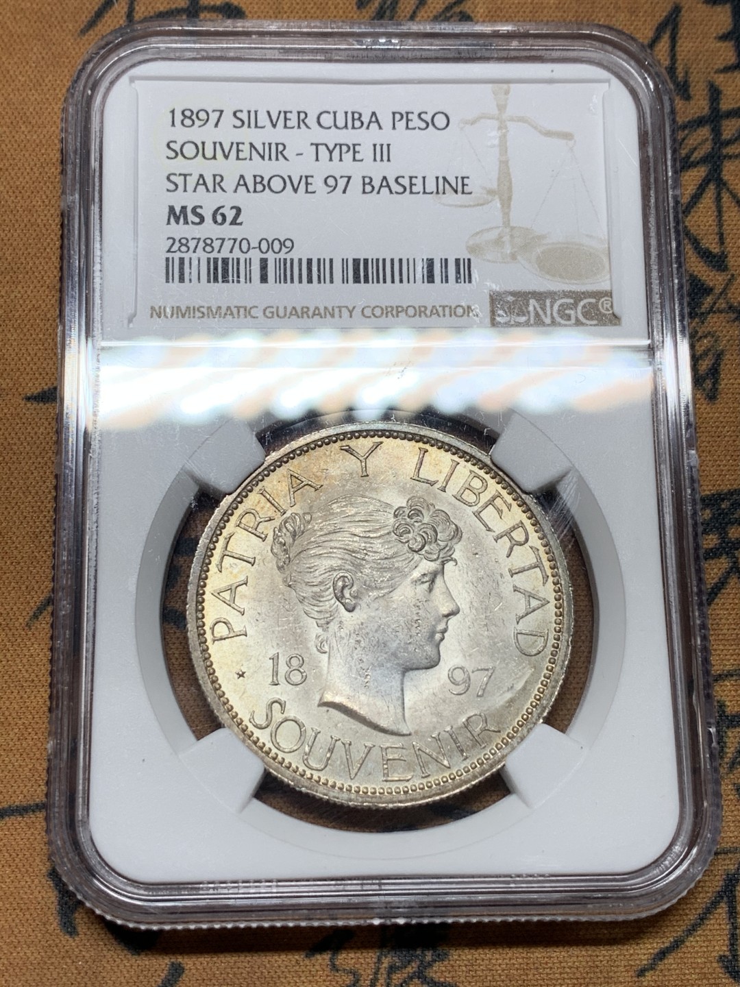 《竞宝斋》第106场-周日，周一 2场连拍（全场包邮） NGC MS62 古巴1897年少女头像1比索银币 原光少见TYPE3版本