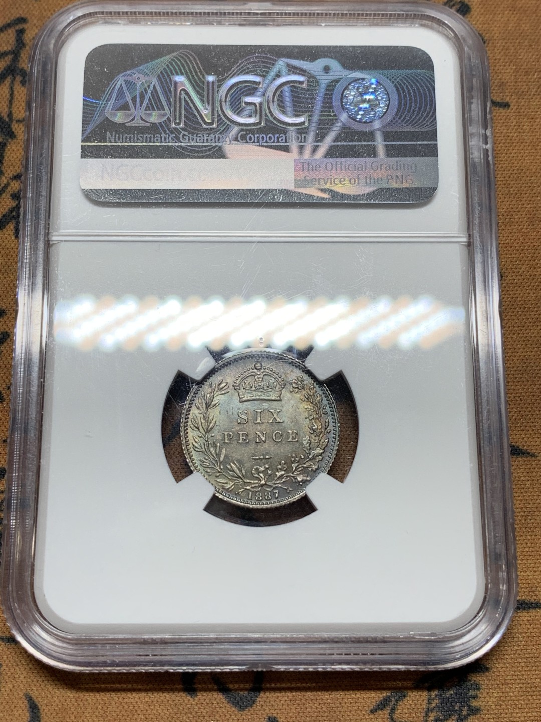 《竞宝斋》第106场-周日，周一 2场连拍（全场包邮） NGC-MS63+ 英国1887年6便士，包浆漂亮，好币