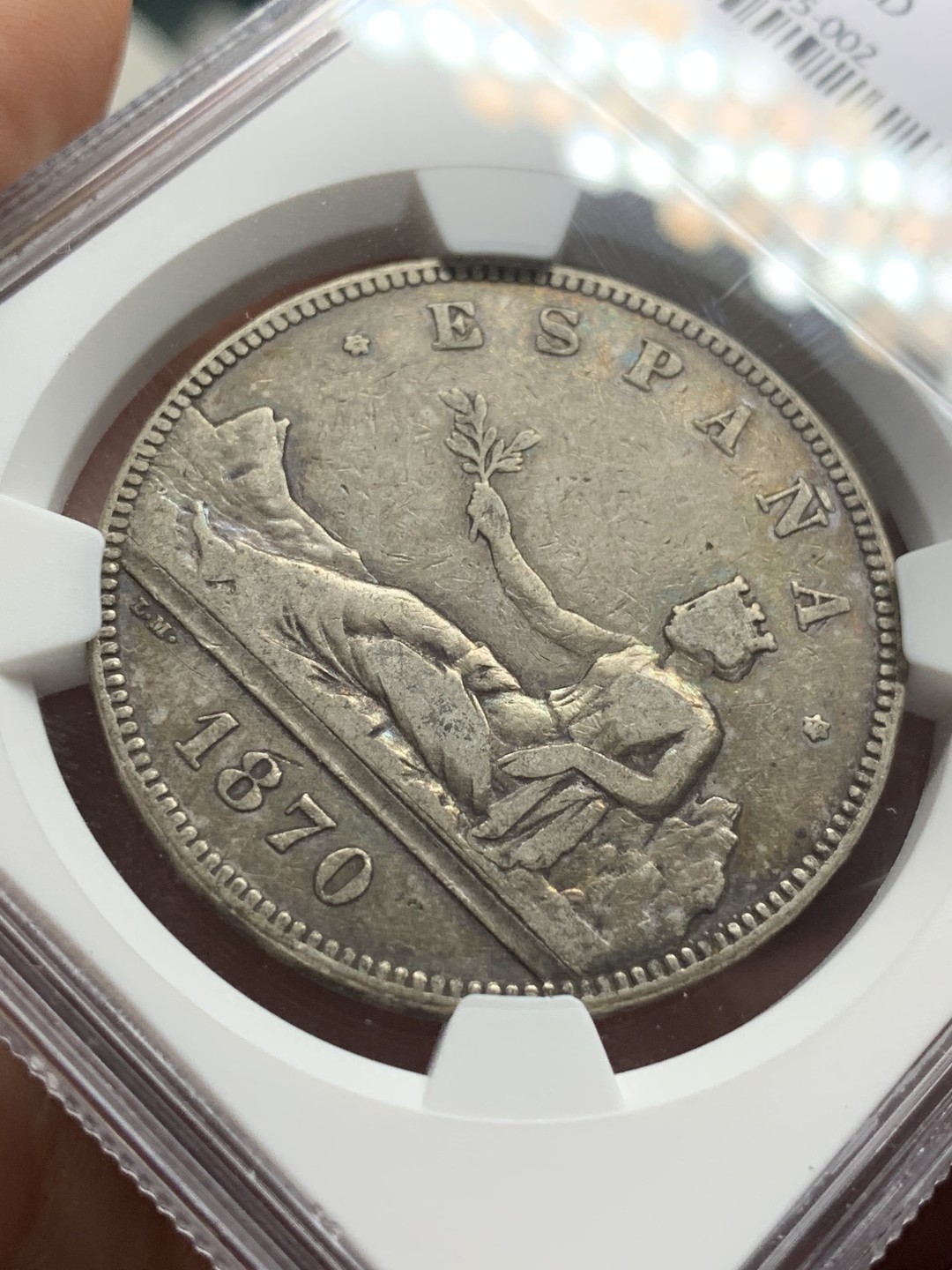 《竞宝斋》第106场-周日，周一 2场连拍（全场包邮） NGC VF 西班牙 1870年 拿花 5比塞塔 银币 包浆好，细节也好，这评级太随性