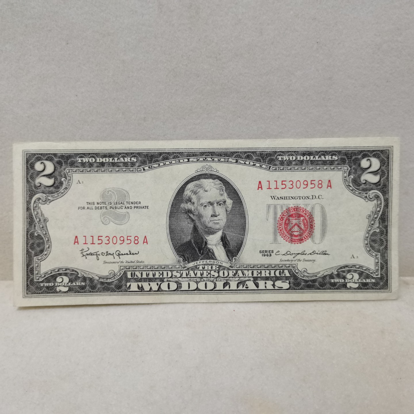 爱淘收藏麦稀奇专场首拍，包邮无押无佣金. 美国1963年红库印AA冠2美元政府券