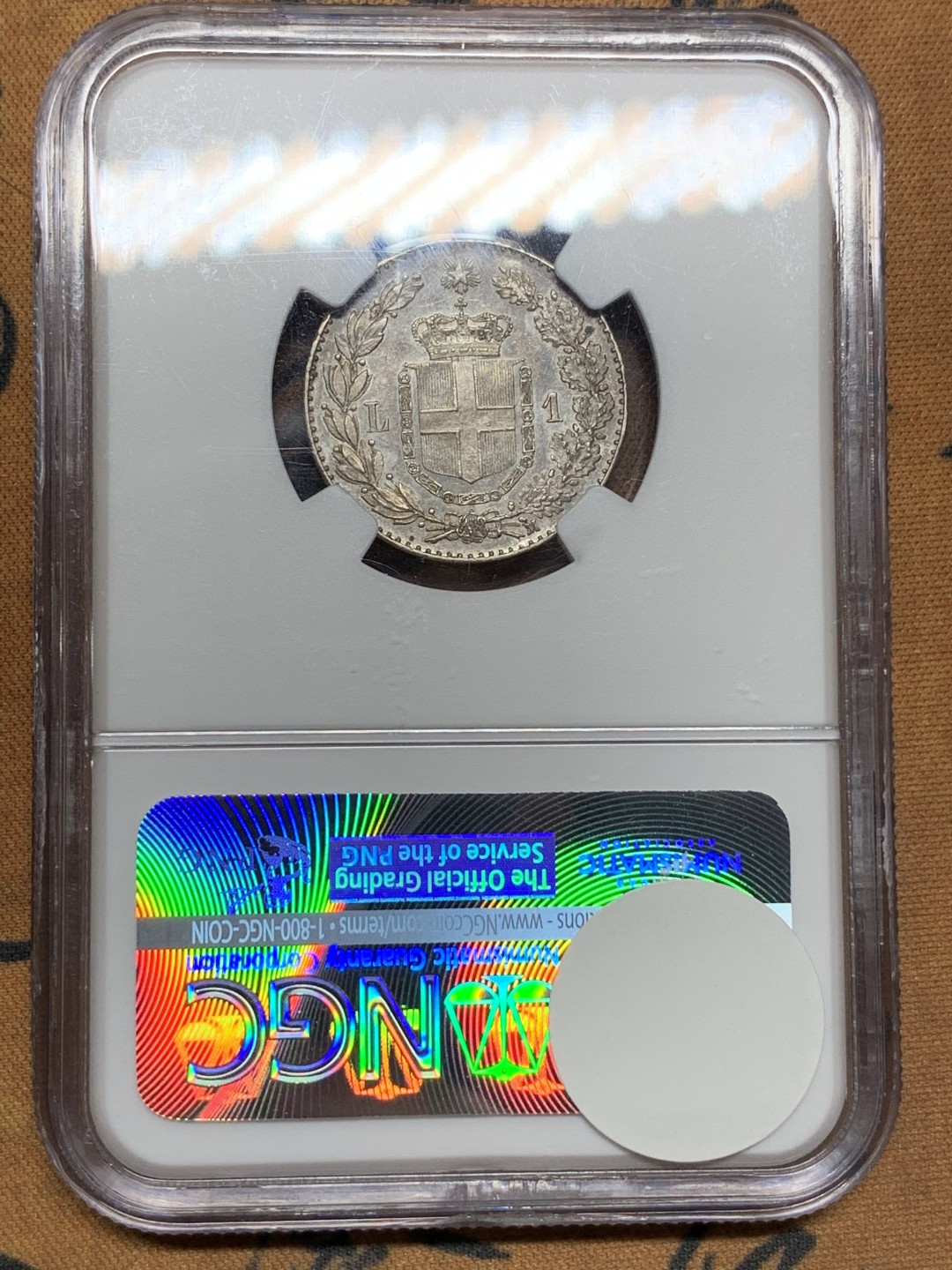 《竞宝斋》第106场-周日，周一 2场连拍（全场包邮） NGC MS62 意大利 1887年 翁贝托1里拉 银币 双面深五彩包浆 状态难得