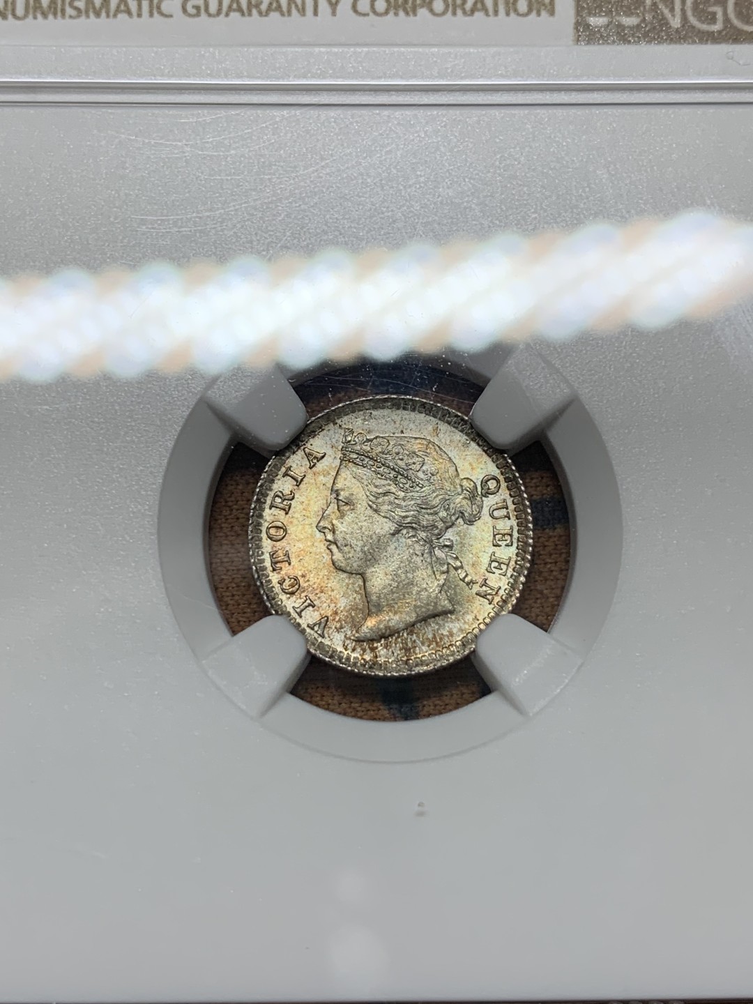 《竞宝斋》第106场-周日，周一 2场连拍（全场包邮） NGC MS63 香港 1901 5仙银币 双面五彩 十字转光