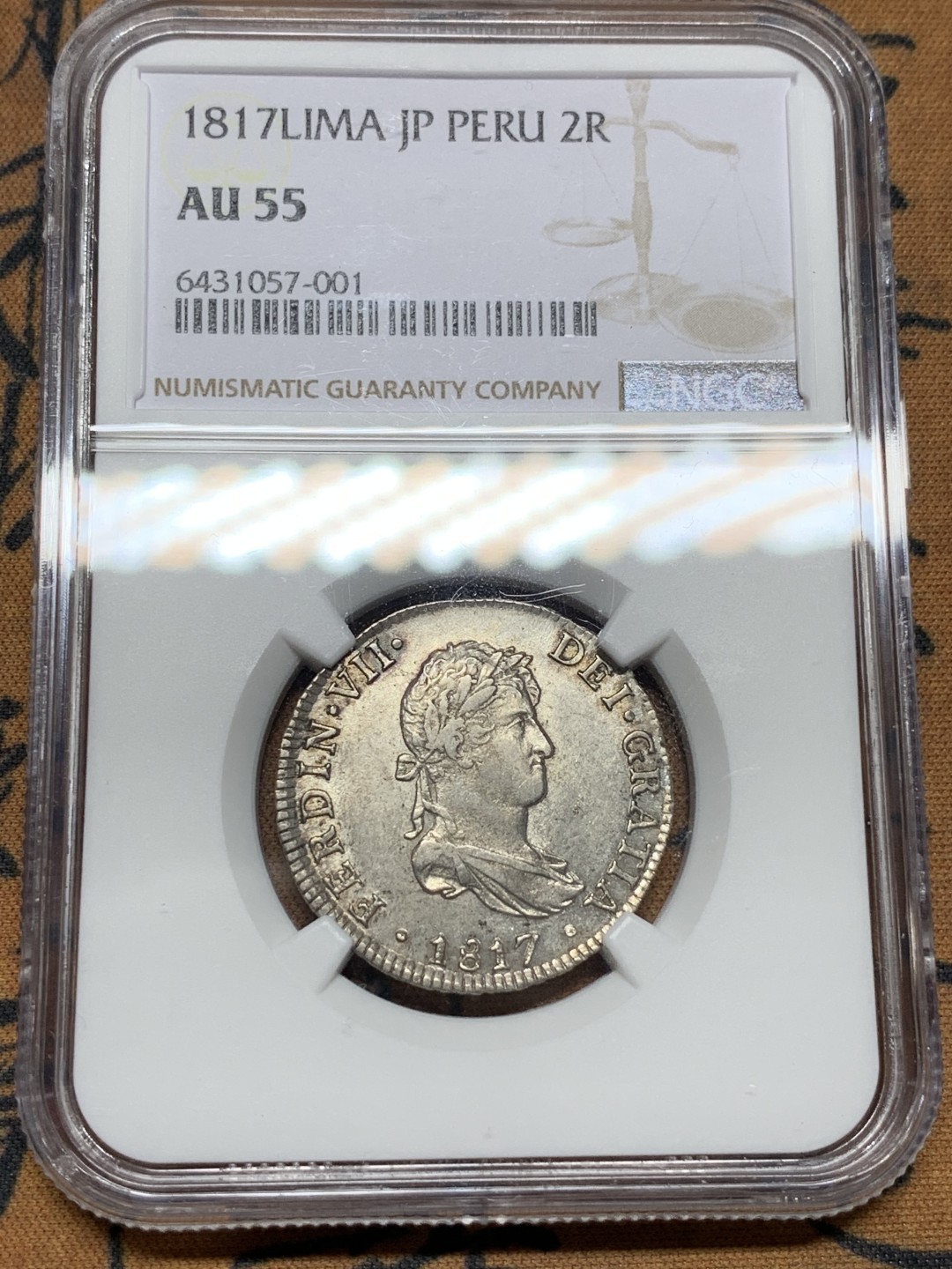 《竞宝斋》第106场-周日，周一 2场连拍（全场包邮） NGC AU55 西属秘鲁1817年费迪南七世2瑞尔银币，少见