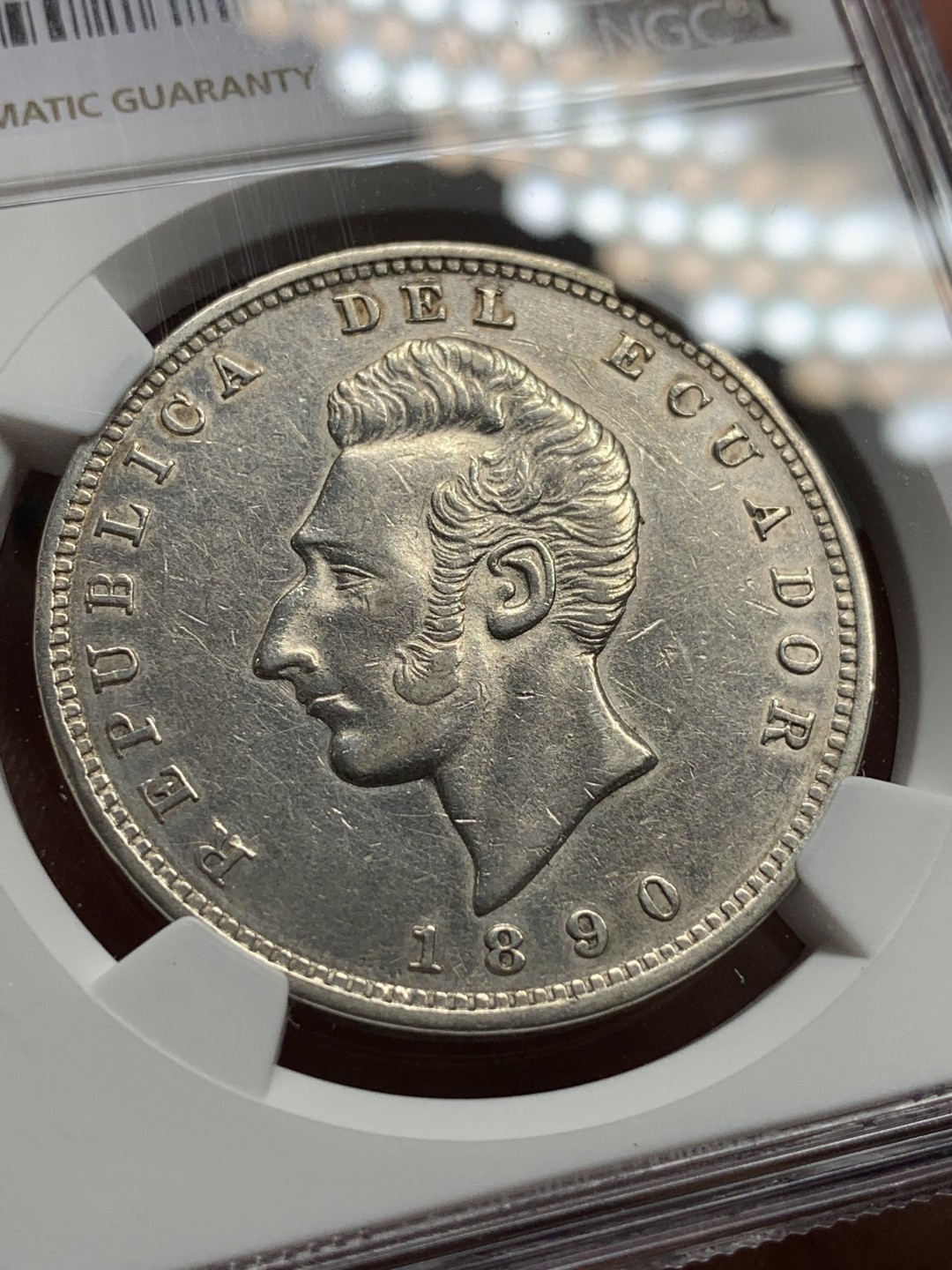 《竞宝斋》第106场-周日，周一 2场连拍（全场包邮） NGC-AUD 厄瓜多尔 1890年 利马厂 1苏克雷大银币 国内不多见 25克 900银