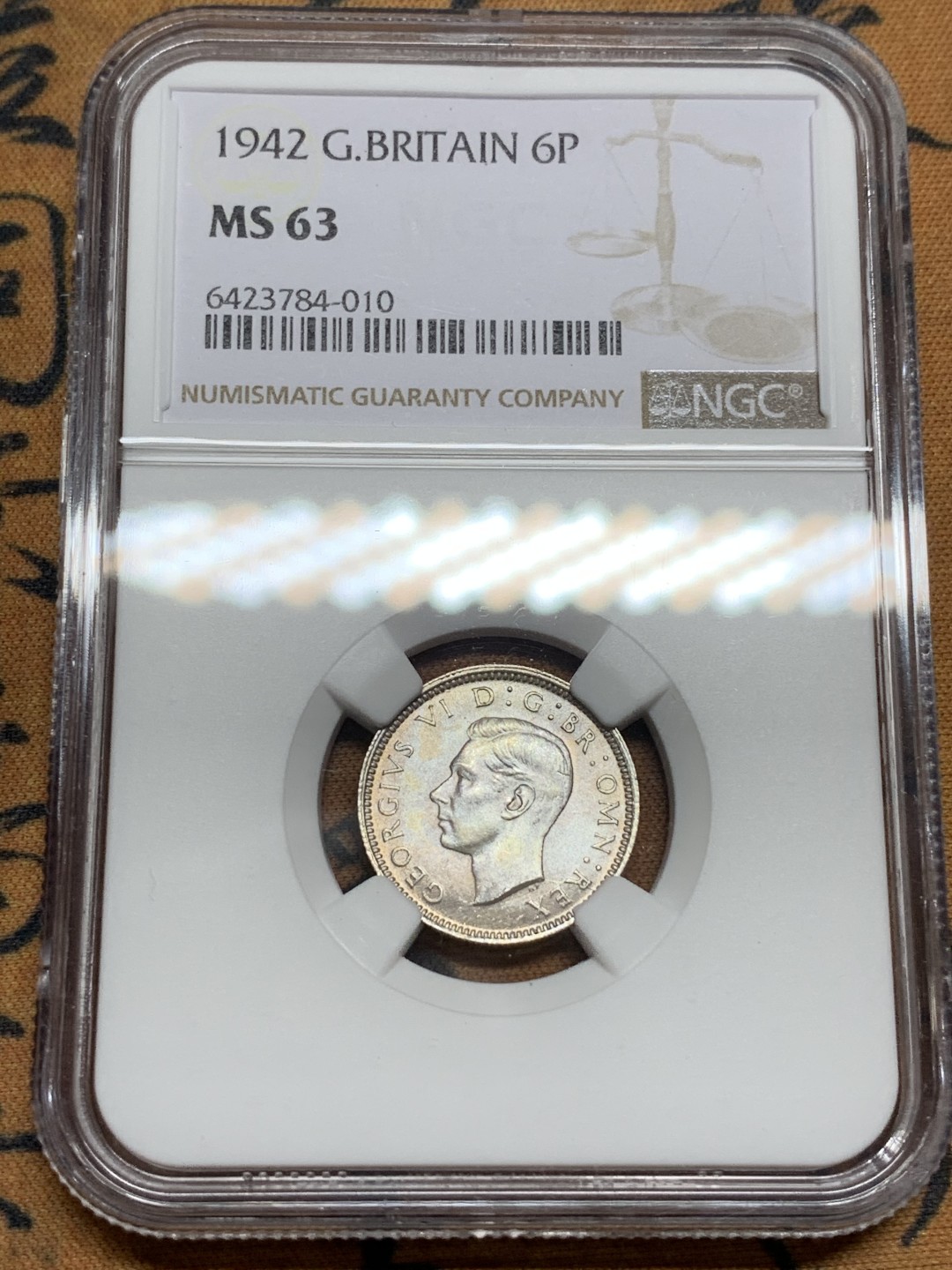 《竞宝斋》第106场-周日，周一 2场连拍（全场包邮） NGC-MS63 英国1942年 乔六6便士银币 原光好品
