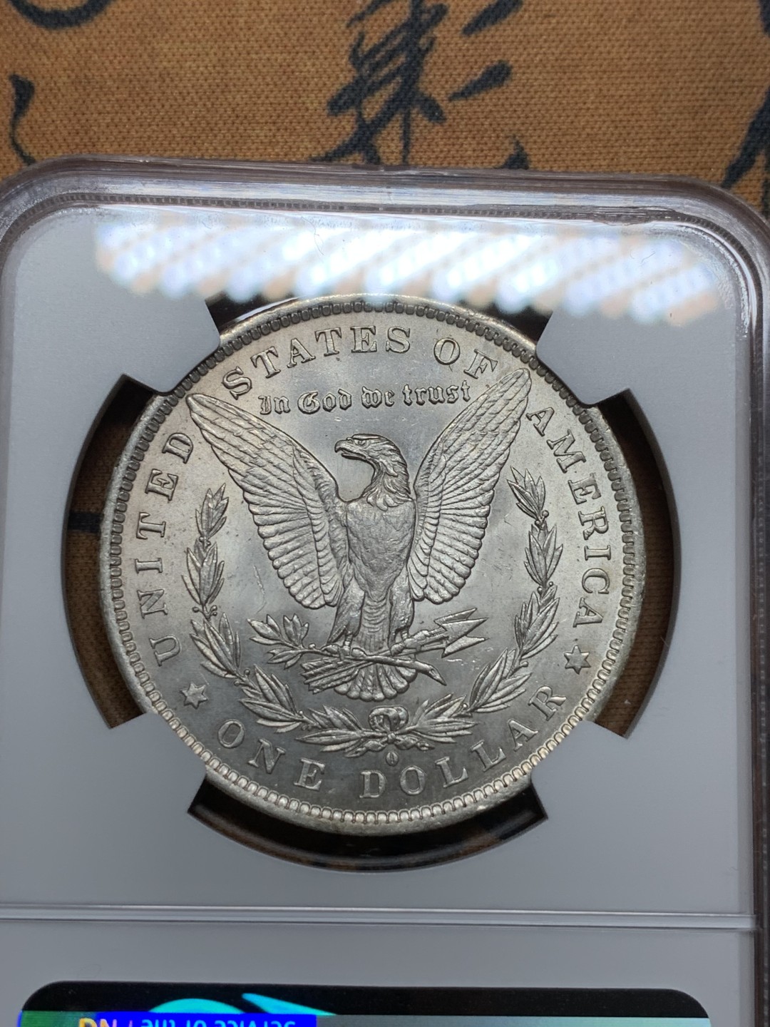 《竞宝斋》第106场-周日，周一 2场连拍（全场包邮） NGC-MS62 美国1884-O年 摩根一元银币 原光好品 较少的厂名