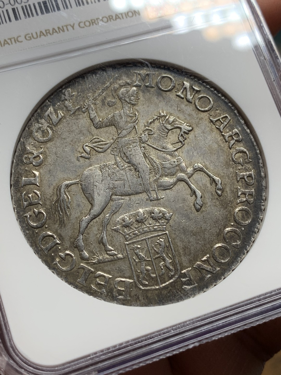 《竞宝斋》第106场-周日，周一 2场连拍（全场包邮） 唯一亚军 NGC AU55 荷兰 海尔德兰省 1774年 杜卡特 大马剑 银币 32克多的重量 原味的双面包浆 比较少的省份 这个工艺已经很好了 细节见图