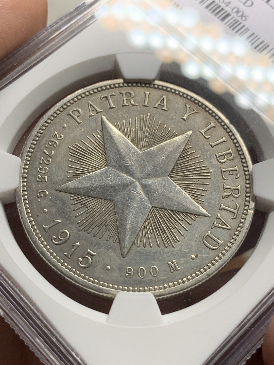 《竞宝斋》第106场-周日，周一 2场连拍（全场包邮） NGC-AUD 古巴 1915年 五星1比索大银币 相对高价的年份