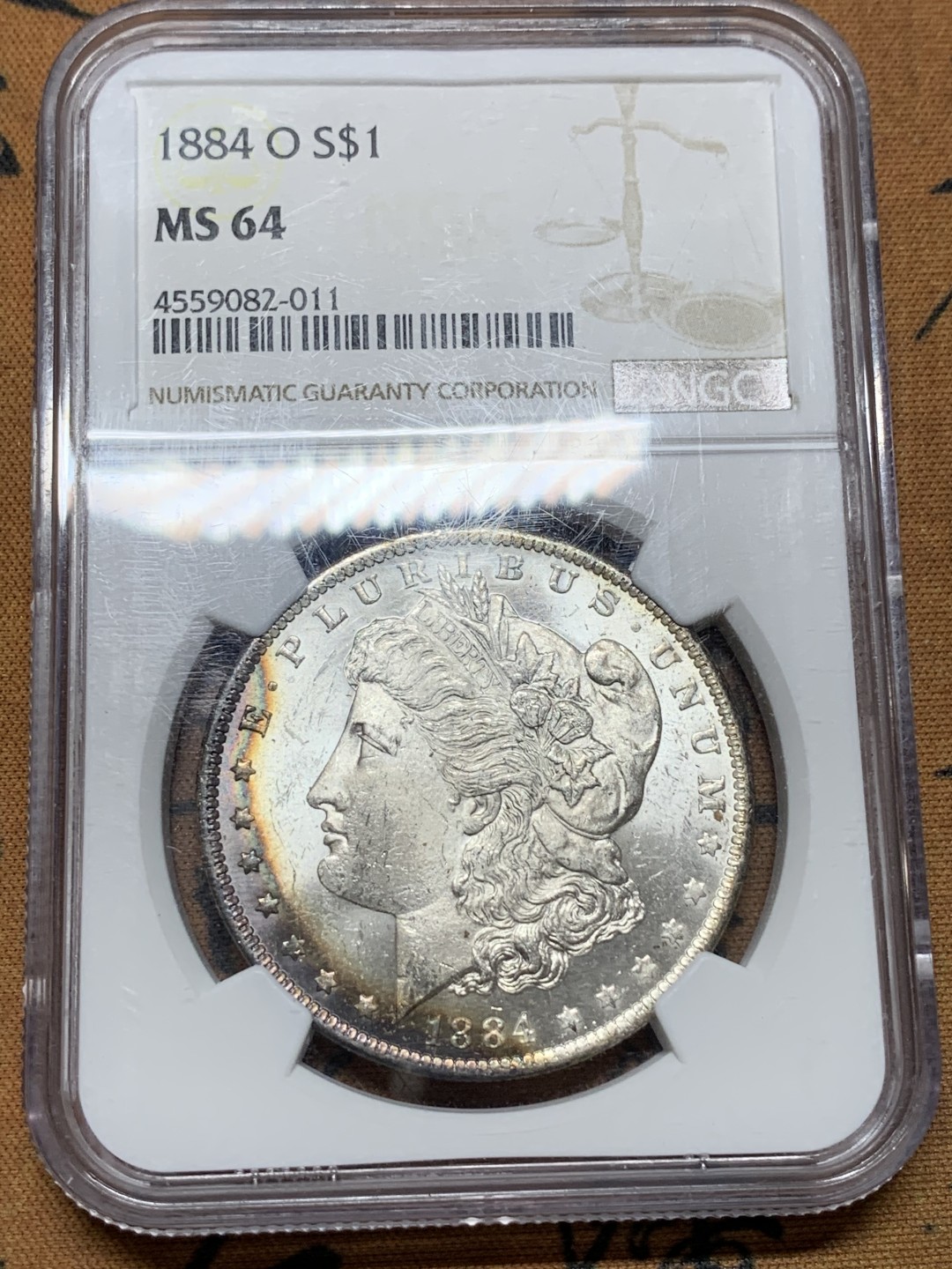 《竞宝斋》第106场-周日，周一 2场连拍（全场包邮） NGC-MS64 美国 1884年 摩根银币 女神面6点-10点 鹰面8点-1点均为rainbow七彩月牙 摩根最贵的彩种