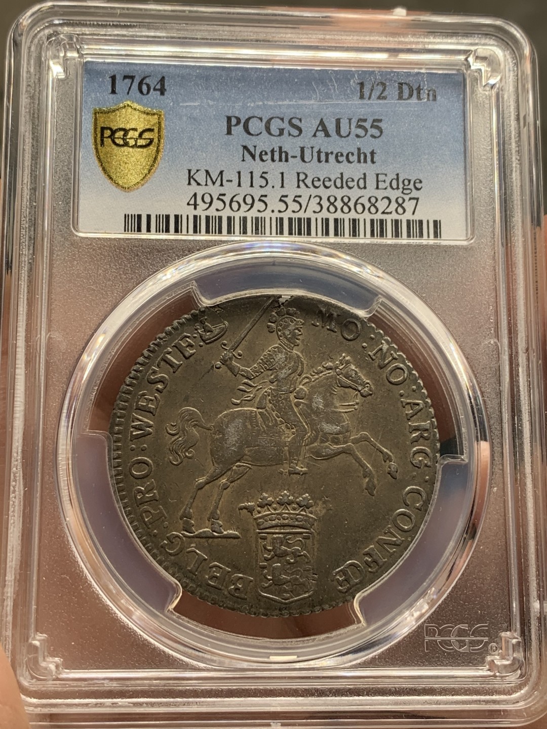《竞宝斋》第106场-周日，周一 2场连拍（全场包邮） 亚军 PCGS AU55 荷兰 少见德 西弗利斯兰省 1764年 半杜卡特马剑银币 早期垂尾品种 双面深彩包浆状态极好 这个状态难觅 P标错了 细节见图