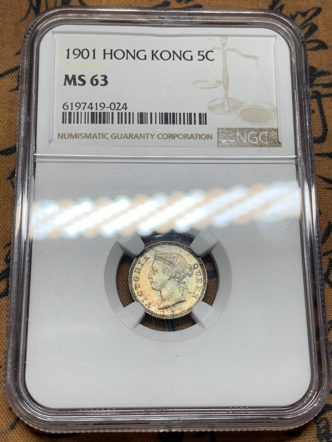 《竞宝斋》第106场-周日，周一 2场连拍（全场包邮） NGC MS63 香港 1901 5仙银币 双面五彩 十字转光