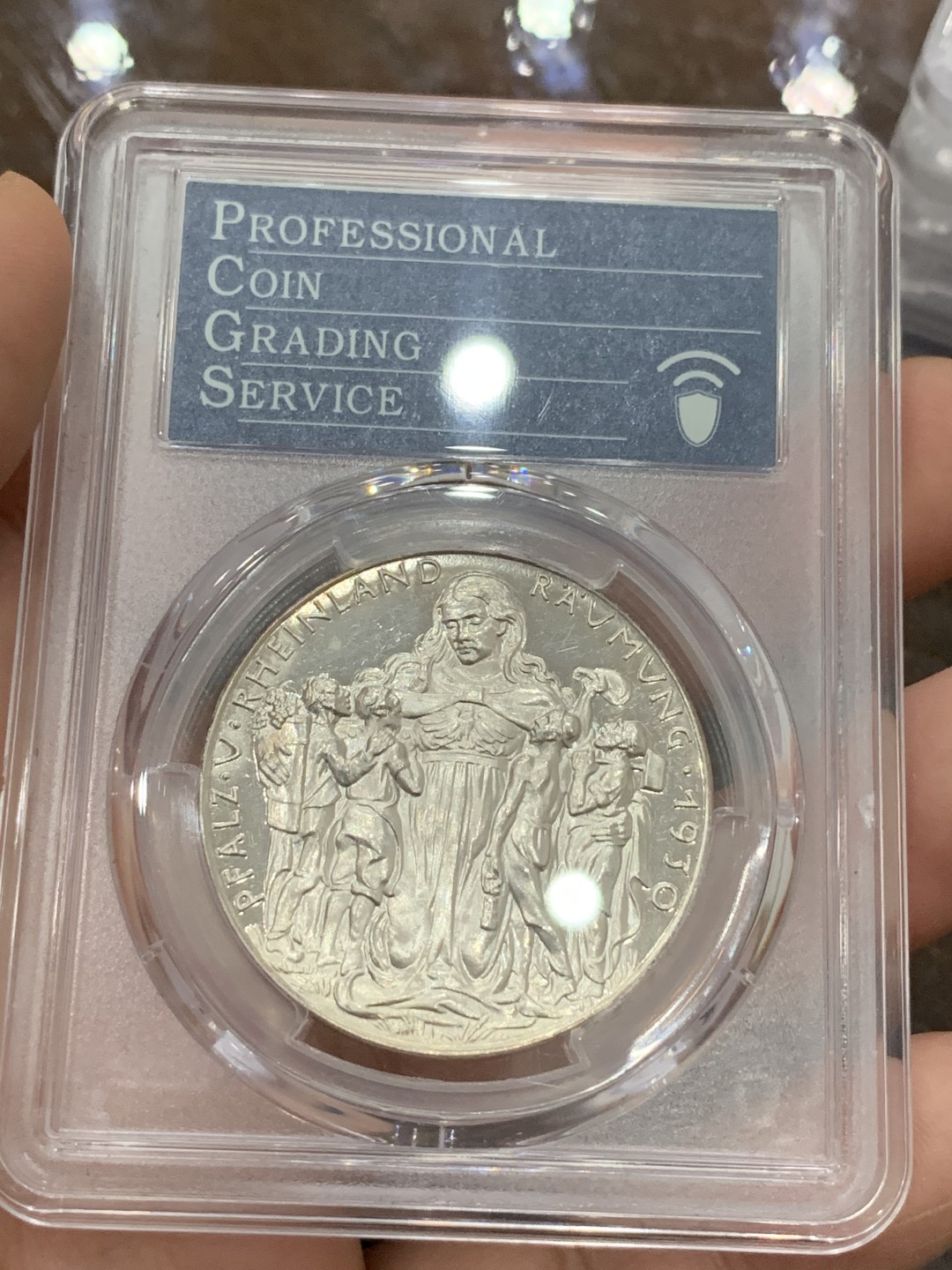 《竞宝斋》第106场-周日，周一 2场连拍（全场包邮） PCGS-MS64 德国1930年卡尔歌茨雕刻莱茵河神纪念银章，PP底板，35周年纪念P盒 高品状态