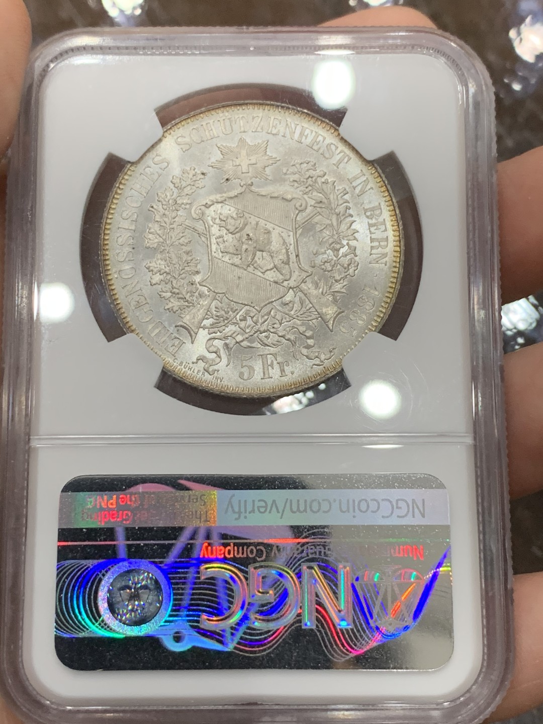 《竞宝斋》第106场-周日，周一 2场连拍（全场包邮） NGC-MS65 1885瑞士伯尔尼射击节5法郎银币 状态及其完美 正面金色包浆背面凝霜 外拍成交价已经很高了