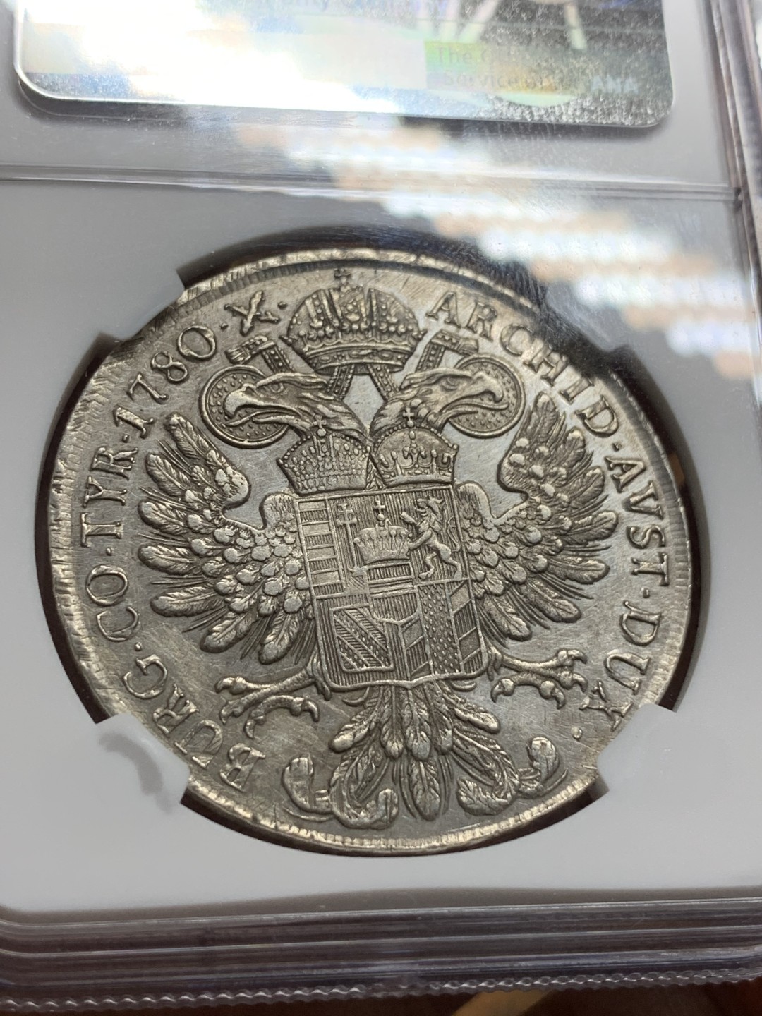 《竞宝斋》第106场-周日，周一 2场连拍（全场包邮） NGC-AUD 奥地利“1780年”特蕾莎1泰勒银币 1817-1833年铸造 威尼斯 对应目录编号应该是37a N就给了早期后铸要加强了